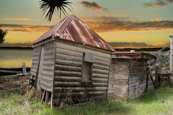 Dilapidated Huts By The Water