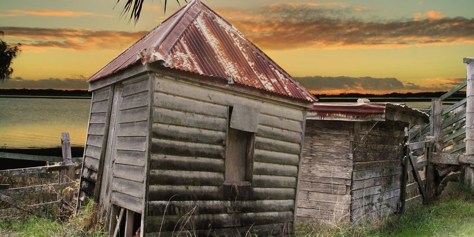 Dilapidated Huts By The Water