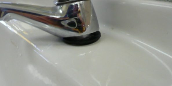 Tap-coming-away-from-basin_Job-526