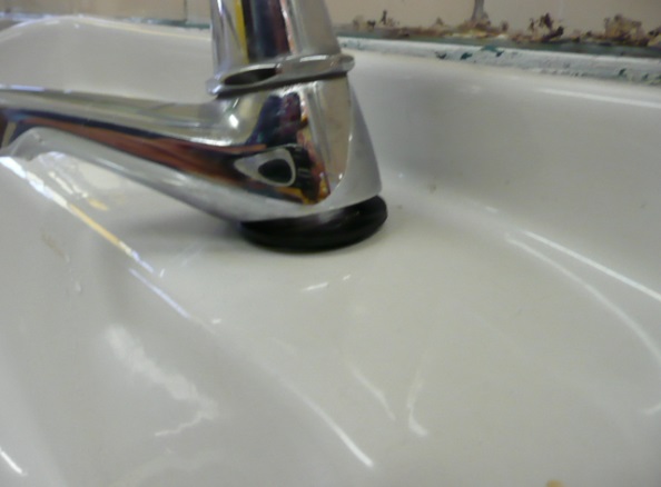 Tap-coming-away-from-basin_Job-526