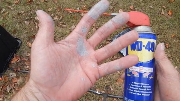 Cleaning hands with WD40 WD-40