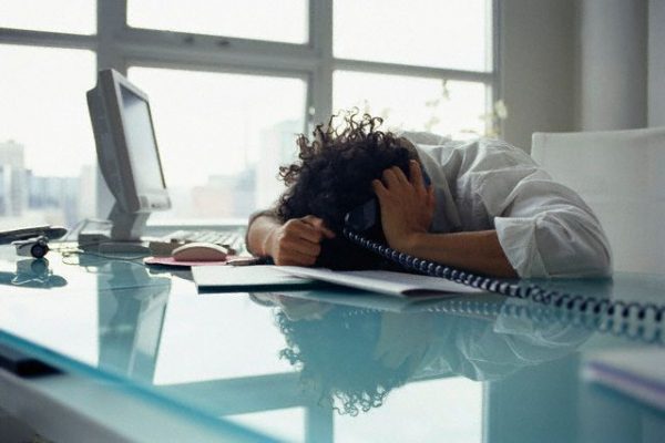 Frustrated Businessman at Desk