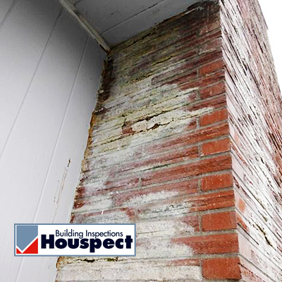 Efflorescence at brick chimney