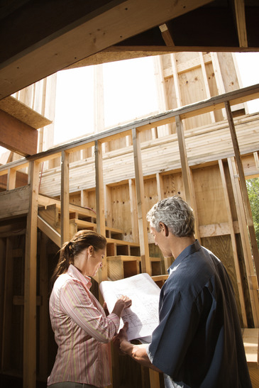Couple looking at new house.